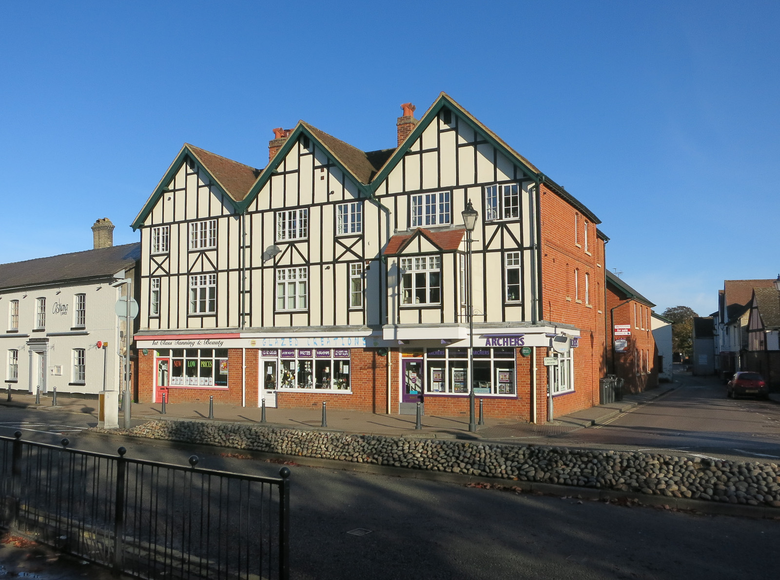 Royston high street with shops and café